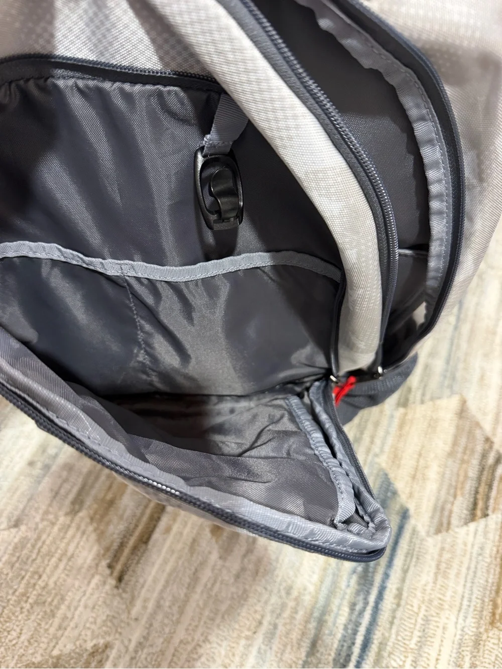 Under Armour Light Gray and Dark Gray Storm Backpack with Red Pulls